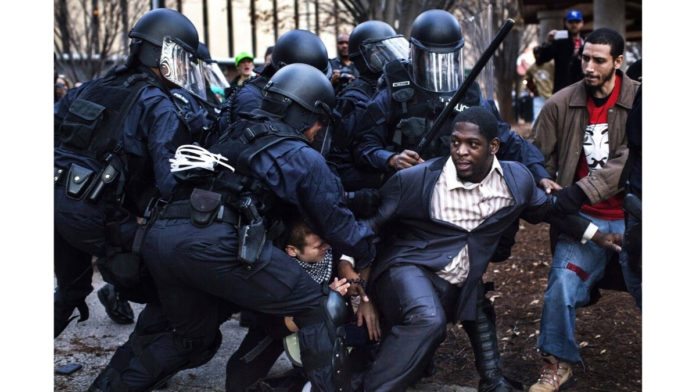 She Photographed Police Abuse at a 2014 BLM March Then Watched the Image Go Viral During Capitol Riot She Photographed Police Abuse at a 2014 BLM March Then Watched the Image Go Viral During Capitol Riot