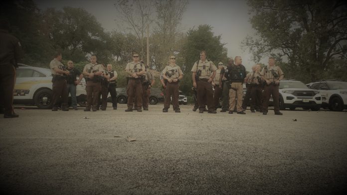 20211004_145703 Cook County Sheriff's Police conduct roll call in Robbins, IL amid village turmoil