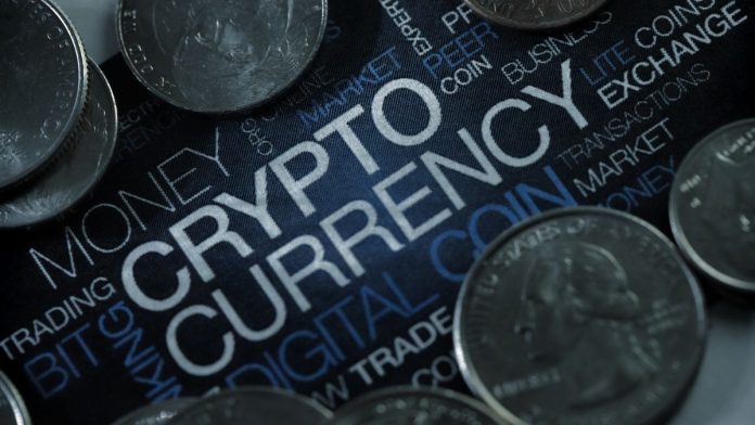 Pritzker signs cryptocurrency bills, sparking debate over protection, innovation