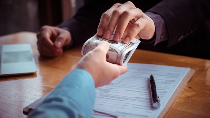 Illinois lawmaker, husband indicted over alleged kickback scheme